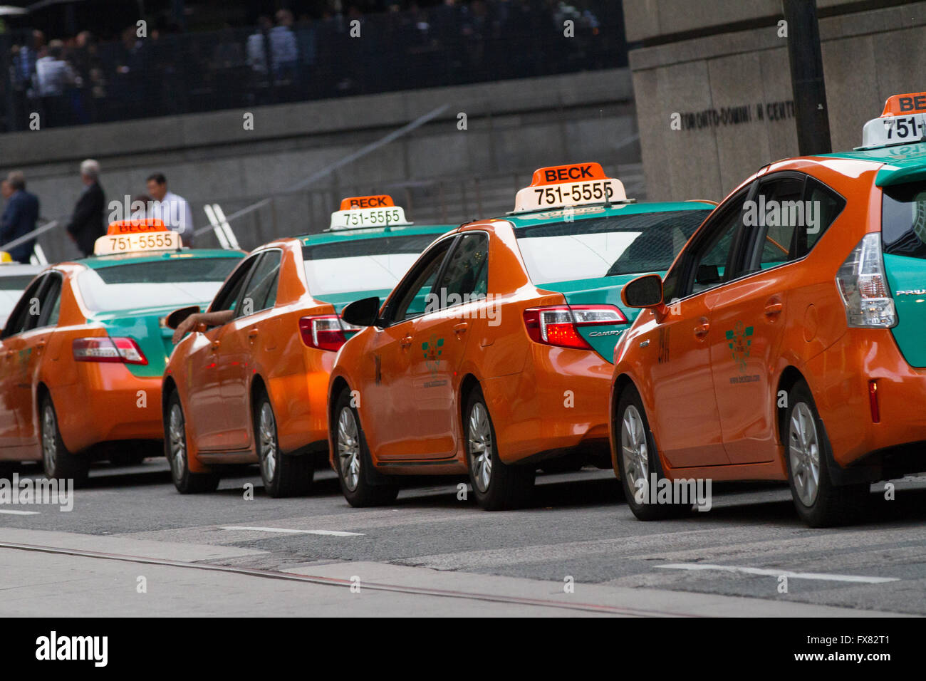 Beck taxi cars are lined up on a street in Toronto, Ont., on July. 29, 2015. Stock Photo