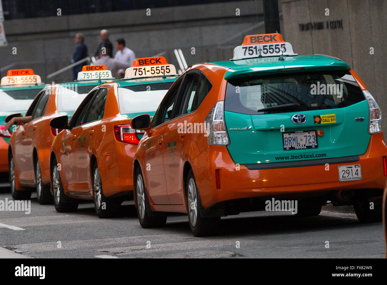 Beck taxi cars are lined up on a street in Toronto, Ont., on July. 29, 2015. Stock Photo