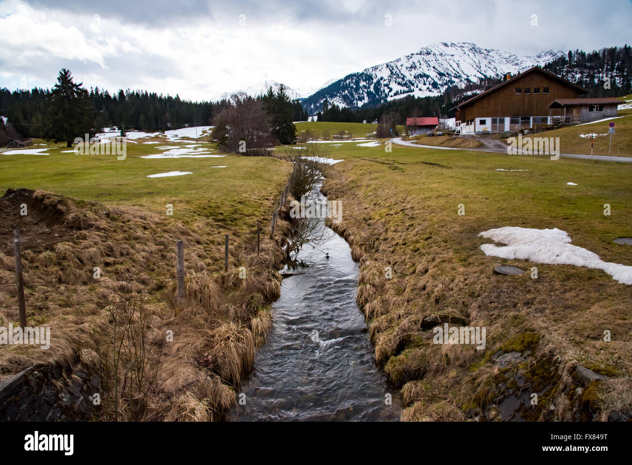 Beautiful view of mountain stream in early spring. Stock Photo