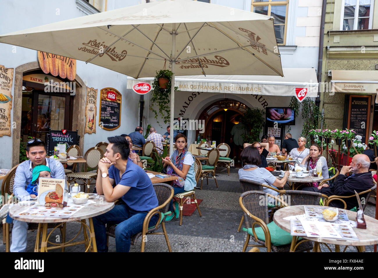 People Tourists Prague Resturant bar and cafe on Malostranske Namesti square, Prague Mala Strana