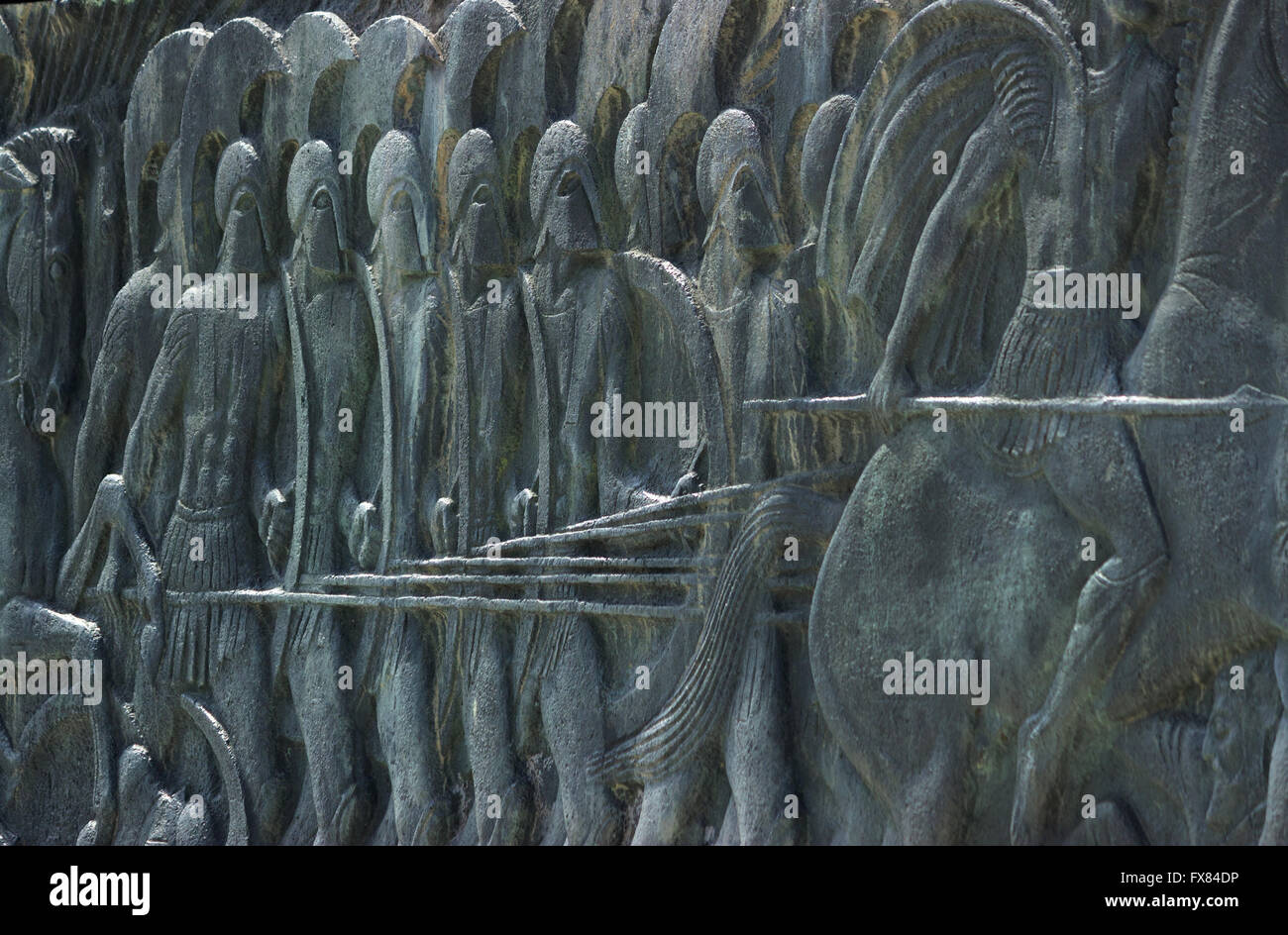Men holding their lances. Alexander the Great memorial sculpture detail. Thessaloniki, Greece. Stock Photo