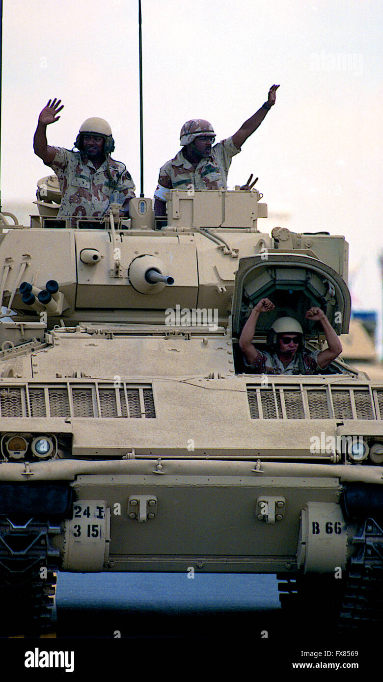 Washington, DC., USA, 8th June, 1991 A flag-waving crowd of 200,000 people cheered veterans of Operation Desert Storm as the nation's capital staged its biggest victory celebration since the end of World War II. Led by Gen. H. Norman Schwarzkopf, about 8,800 troops - including the 1st U.S. Army from Fort Meade march across Arlington Memorial Bridge. 31 war machines such as M-1 tanks, Humvees, rocket launchers and the famed Patriot missile also are included in the parade.  Bradley Fighting vehicle drives the over memorial bridge.  Credit: Mark Reinstein Stock Photo