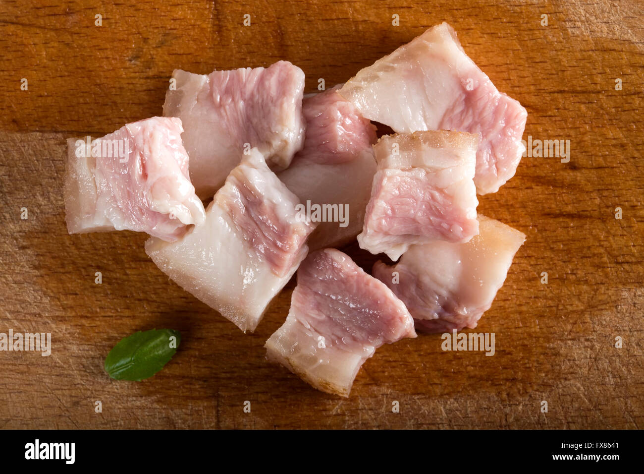 Heap of fat pieces raw pork on wooden background Stock Photo Alamy