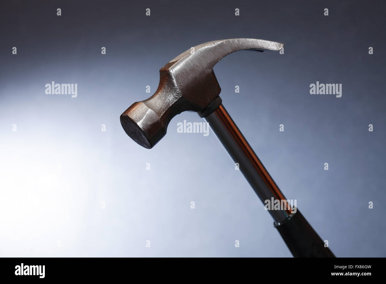 Work tool. Metal hammer closeup on nice dark background Stock Photo