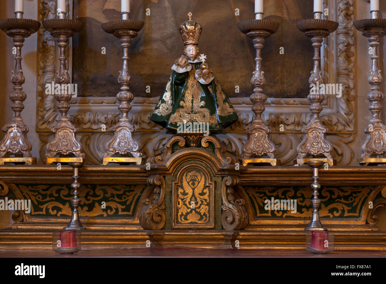 Replica of the Infant Jesus of Prague graces a side-altar at the Church of Our Lady of Victory in Valletta. Stock Photo