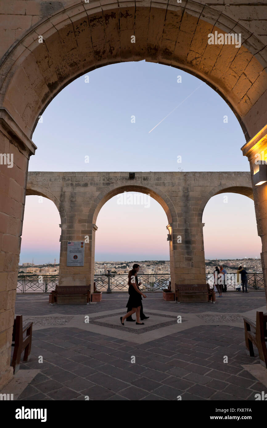 The arcades of Upper Barakka Gardens and the parapet beyond offer panoramic views of the Grand Harbour and the Three CIties. Stock Photo