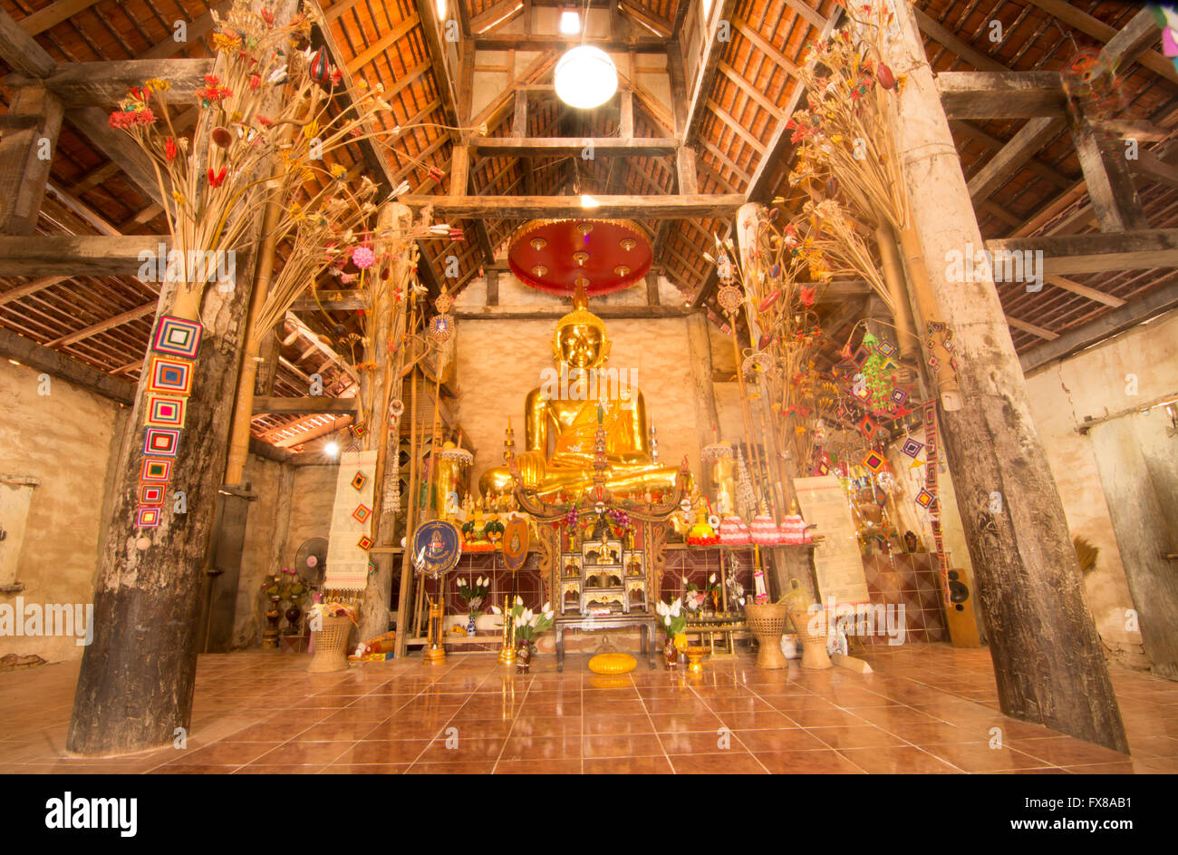 Vintage golden buddha statue image in Na Haeo temple ,Thailand Stock Photo