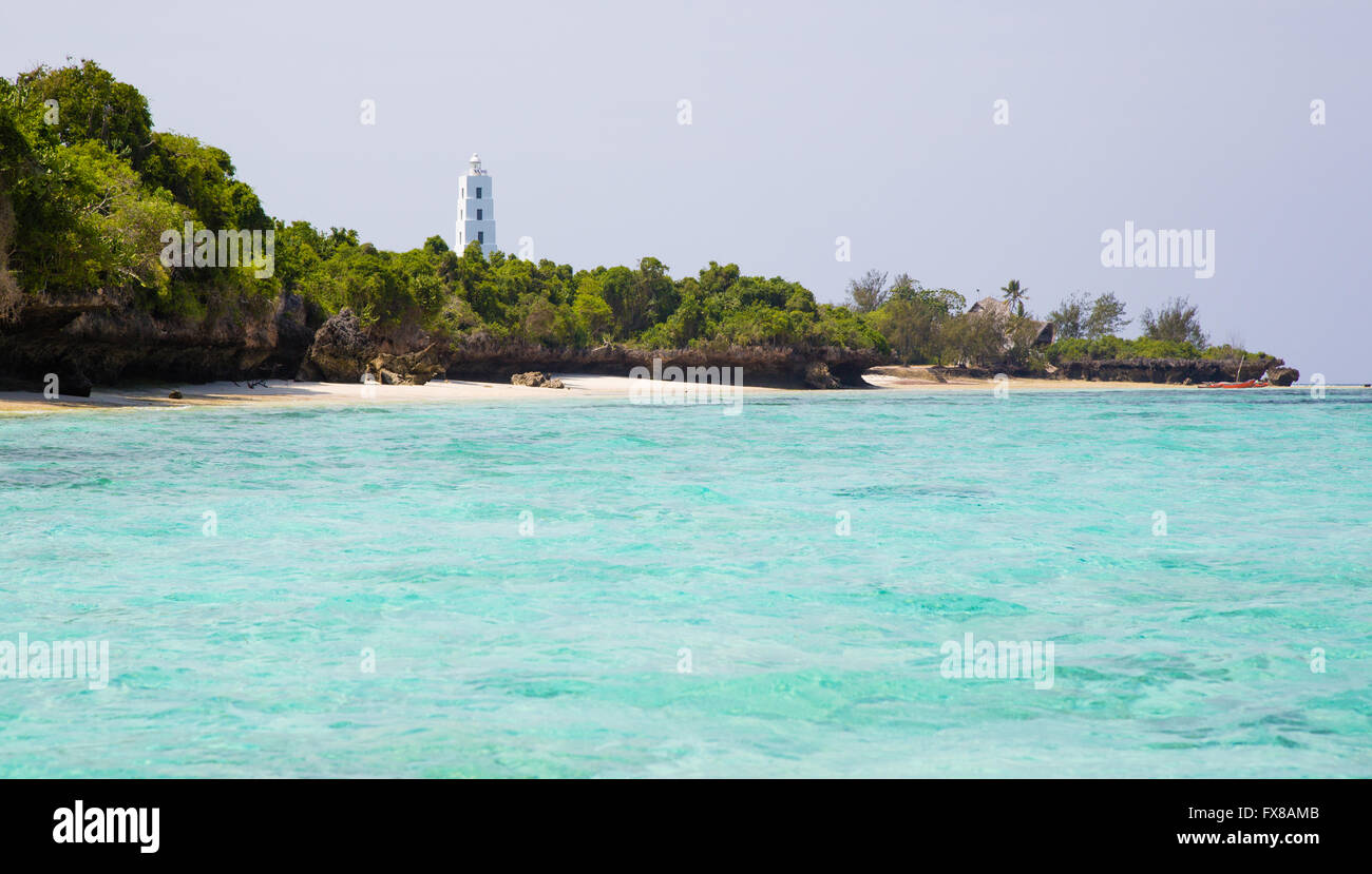Turquoise waters and lighthouse of Chumbe a coral island and reef system off the coast of Zanzibar East Africa Stock Photo