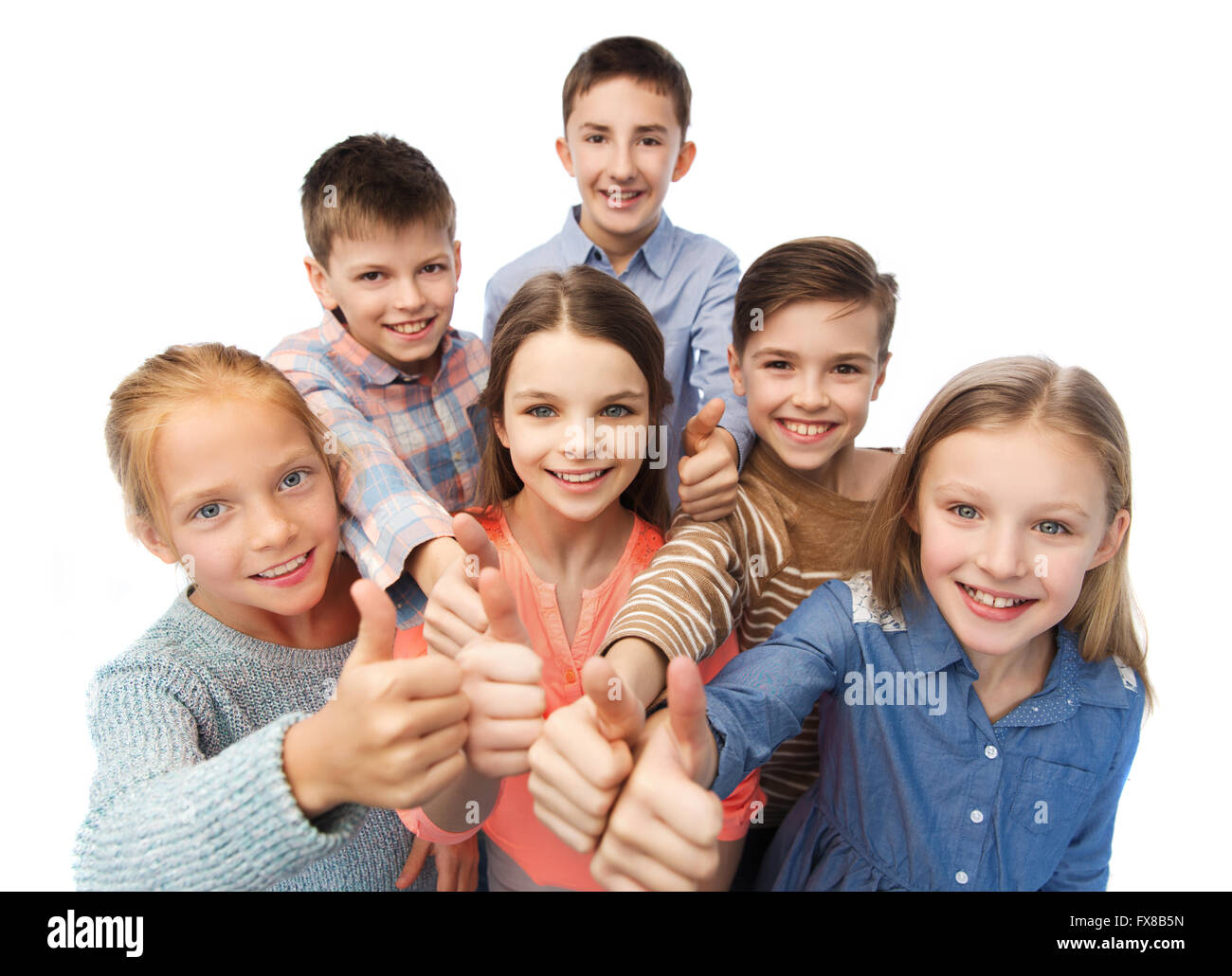 happy children showing thumbs up Stock Photo - Alamy