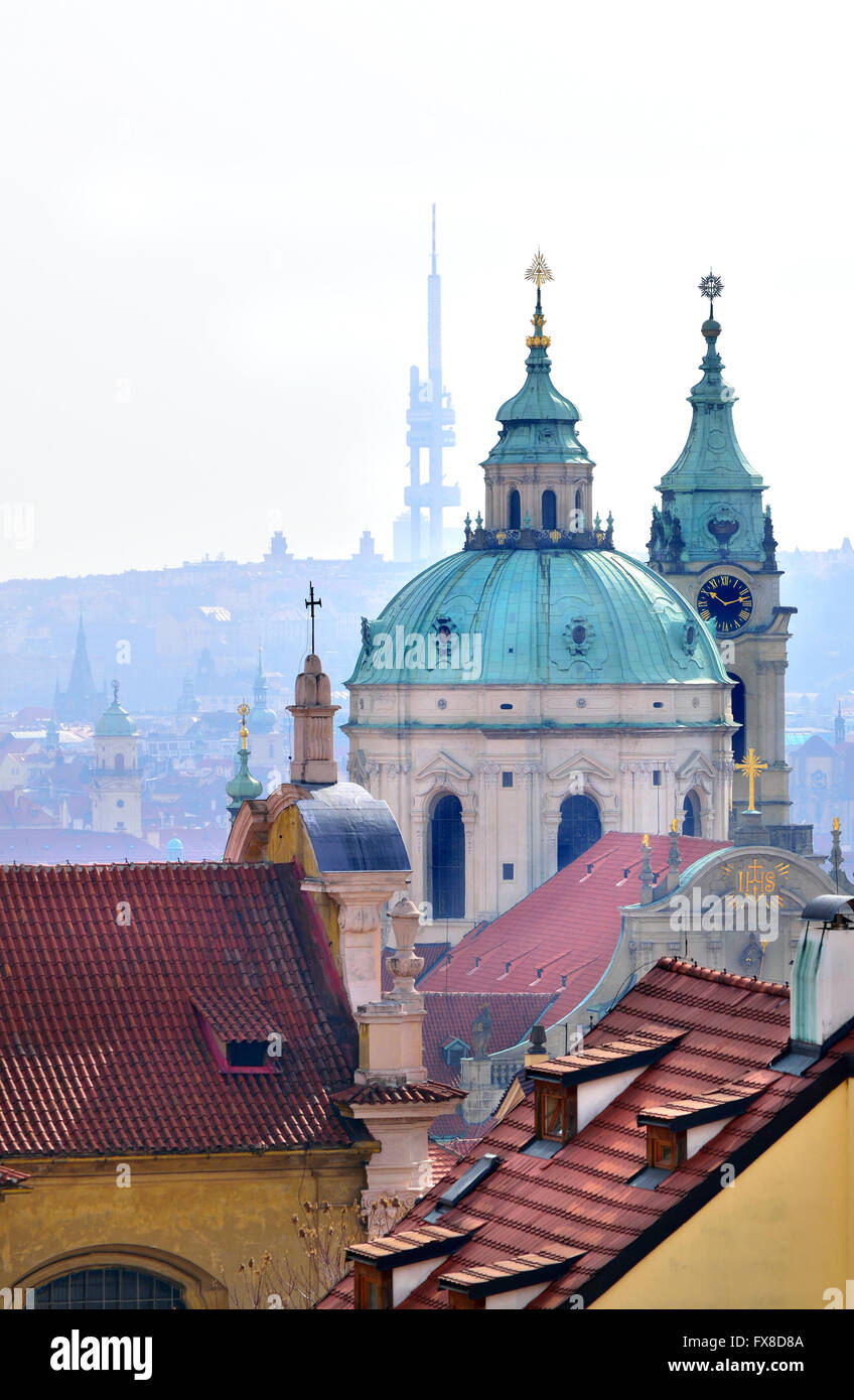 Prague, Czech Republic. St Nicholas Church (Kostel svatého Mikuláše - 1755, Baroque) from the Castle, Žižkov TV Tower behind Stock Photo