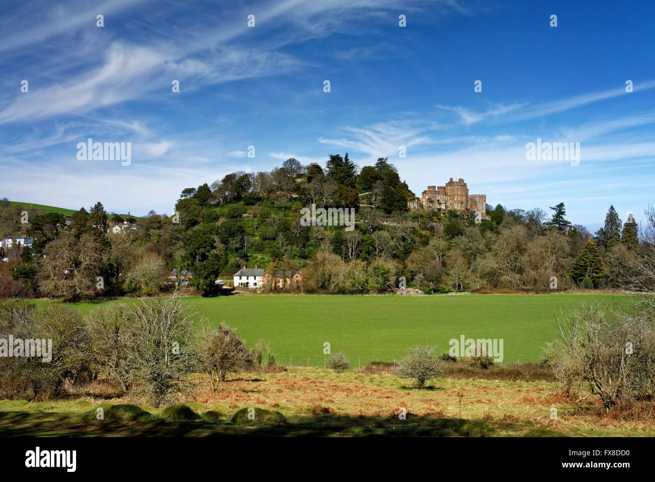 UK, Somerset, Dunster, View of Dunster Castle from nearby countryside Stock Photo