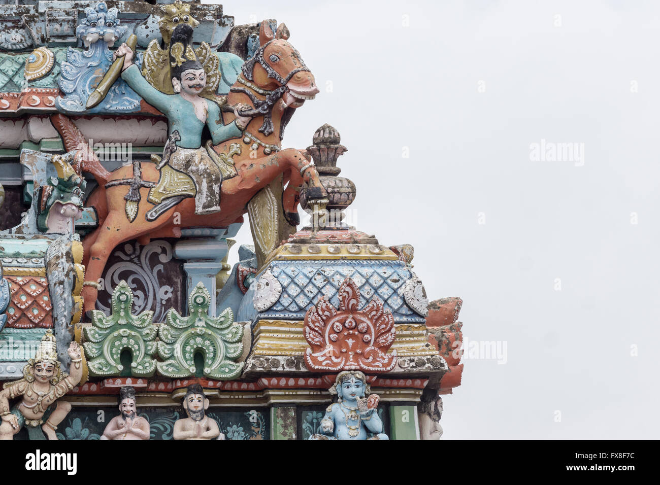 Corner of Gopuram featuring man on horse. Stock Photo