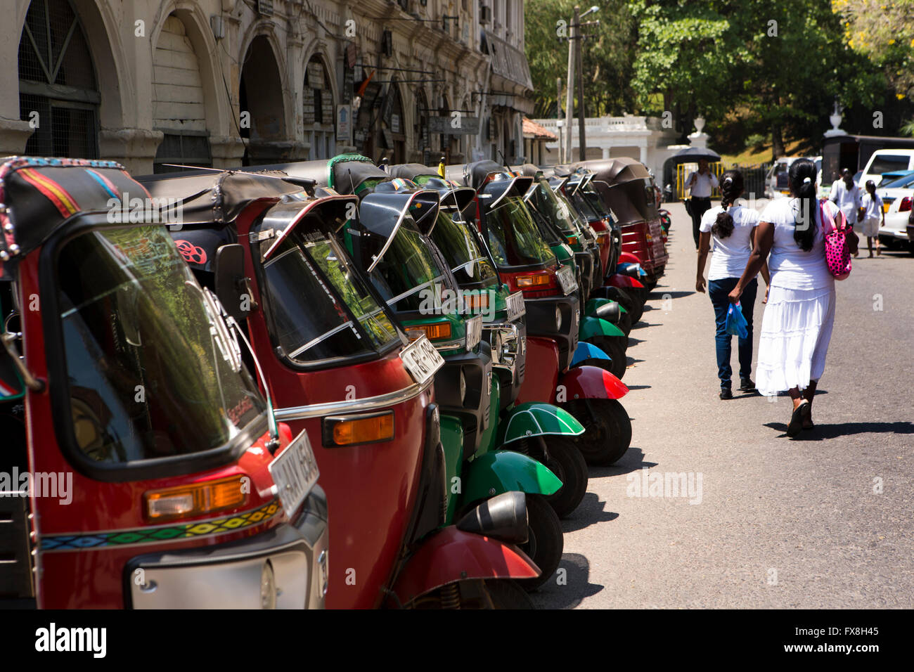 Sri Lanka, Kandy, Deva Vidiya, line of red auto rickshaw tuk-tuks Stock Photo