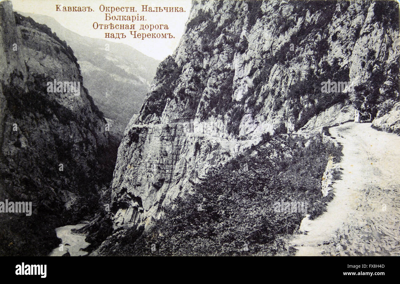 Postcard printed in Russia shows Steep road over the river Cherek around Nalchik, Bolkar, Caucasus, circa 1910 Stock Photo