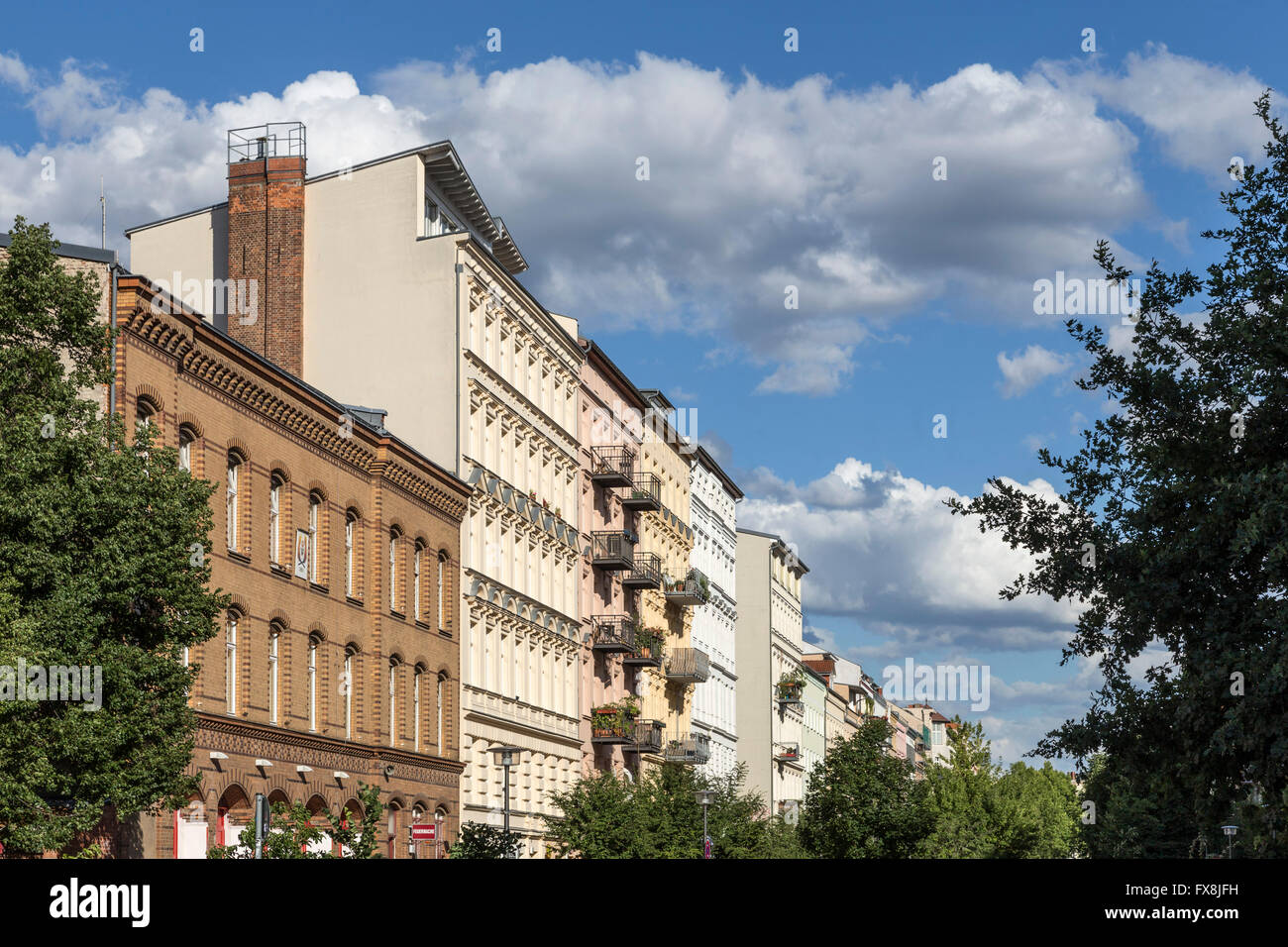 Oderberger Strasse, Fire Station, town houses, Clouds, Prenzlauer Berg, Berlin Stock Photo