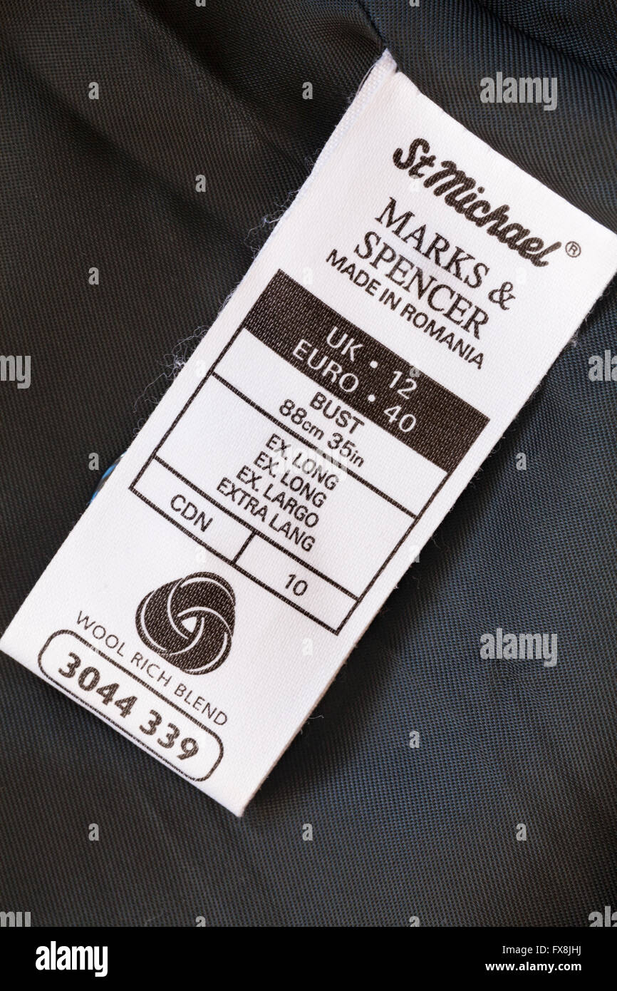 Label in Marks & Spencer Wool Rich Blend coat made in Romania - sold in the UK United Kingdom, Great Britain Stock Photo