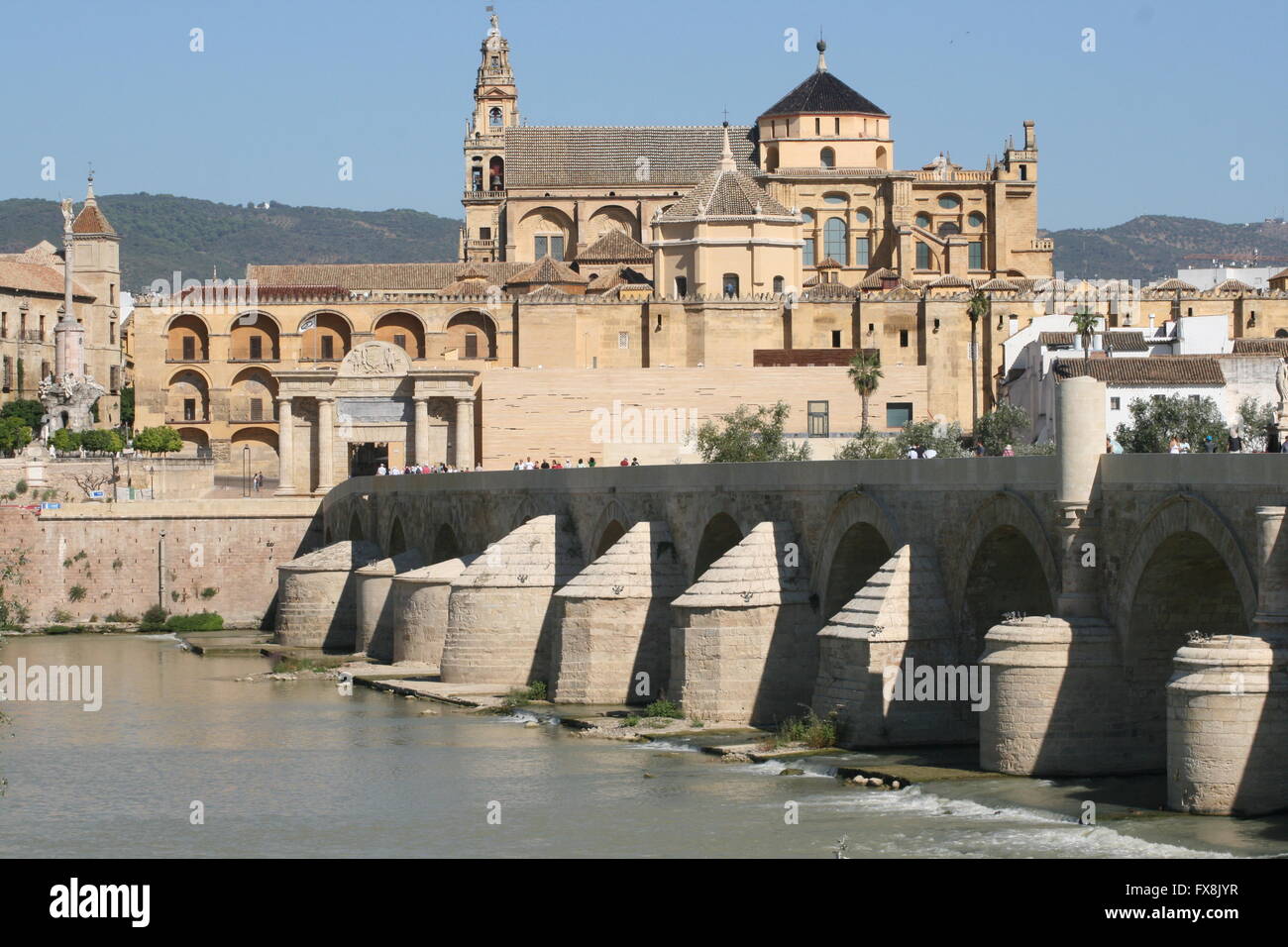 The Roman bridge into the City of Cordoba and to La Mezquita Stock Photo