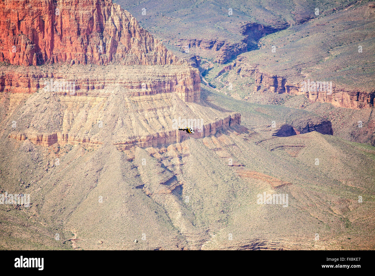 Helicopter carrying load over Grand Canyon, Arizona, USA. Stock Photo