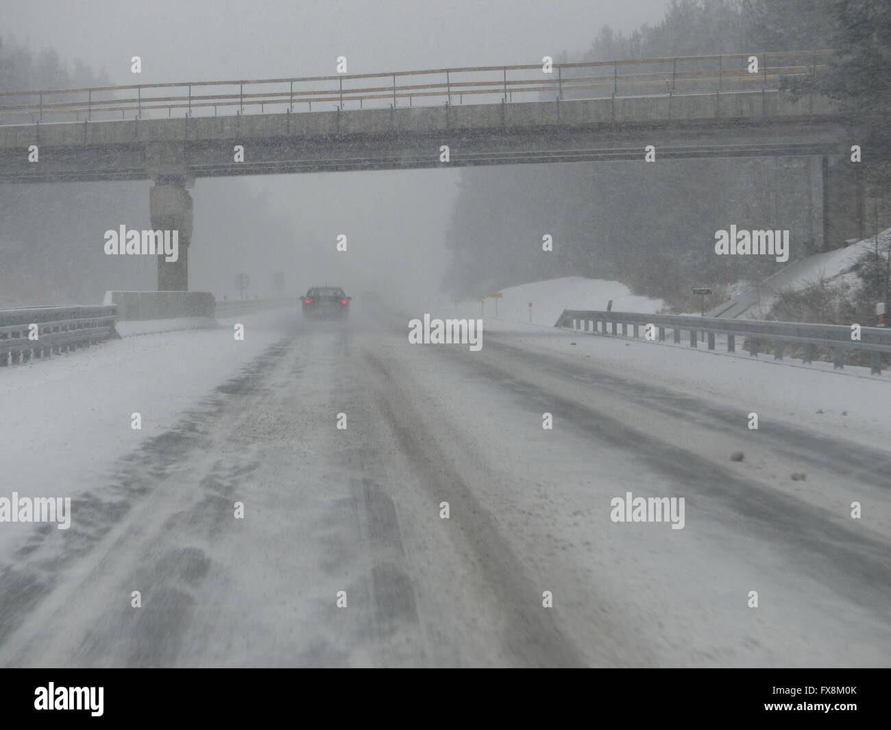 Highway in winter, slippery, dangerous driving conditions Stock Photo