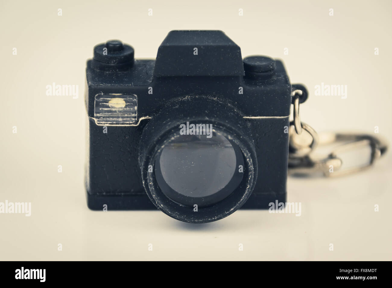 miniature photo camera toy - photography concept, vintage filter Stock Photo