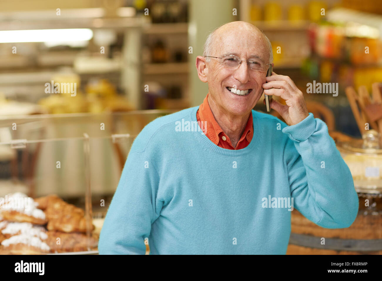Taking a call from happy client Stock Photo