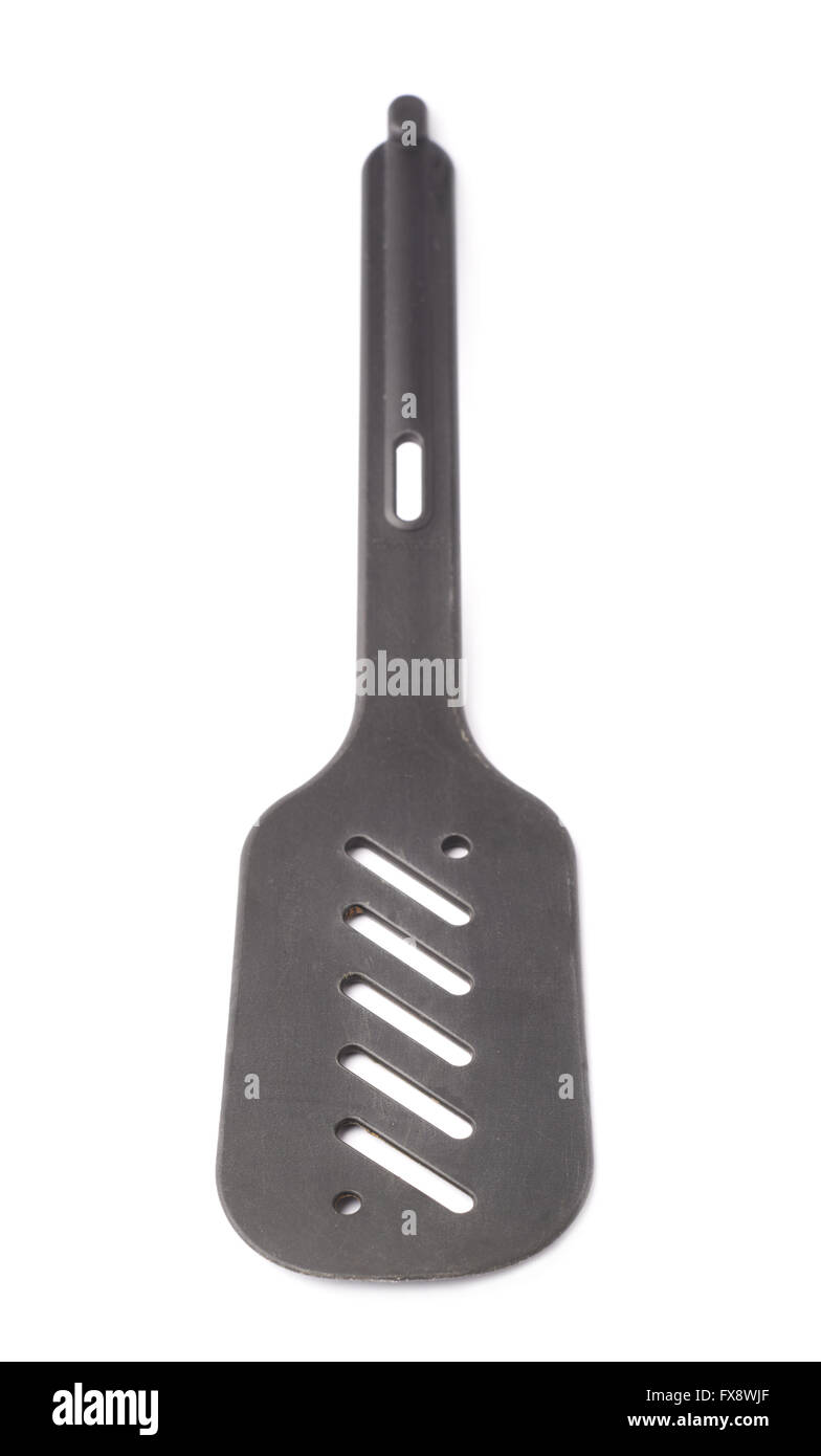 Used black plastic spatula isolated Stock Photo - Alamy