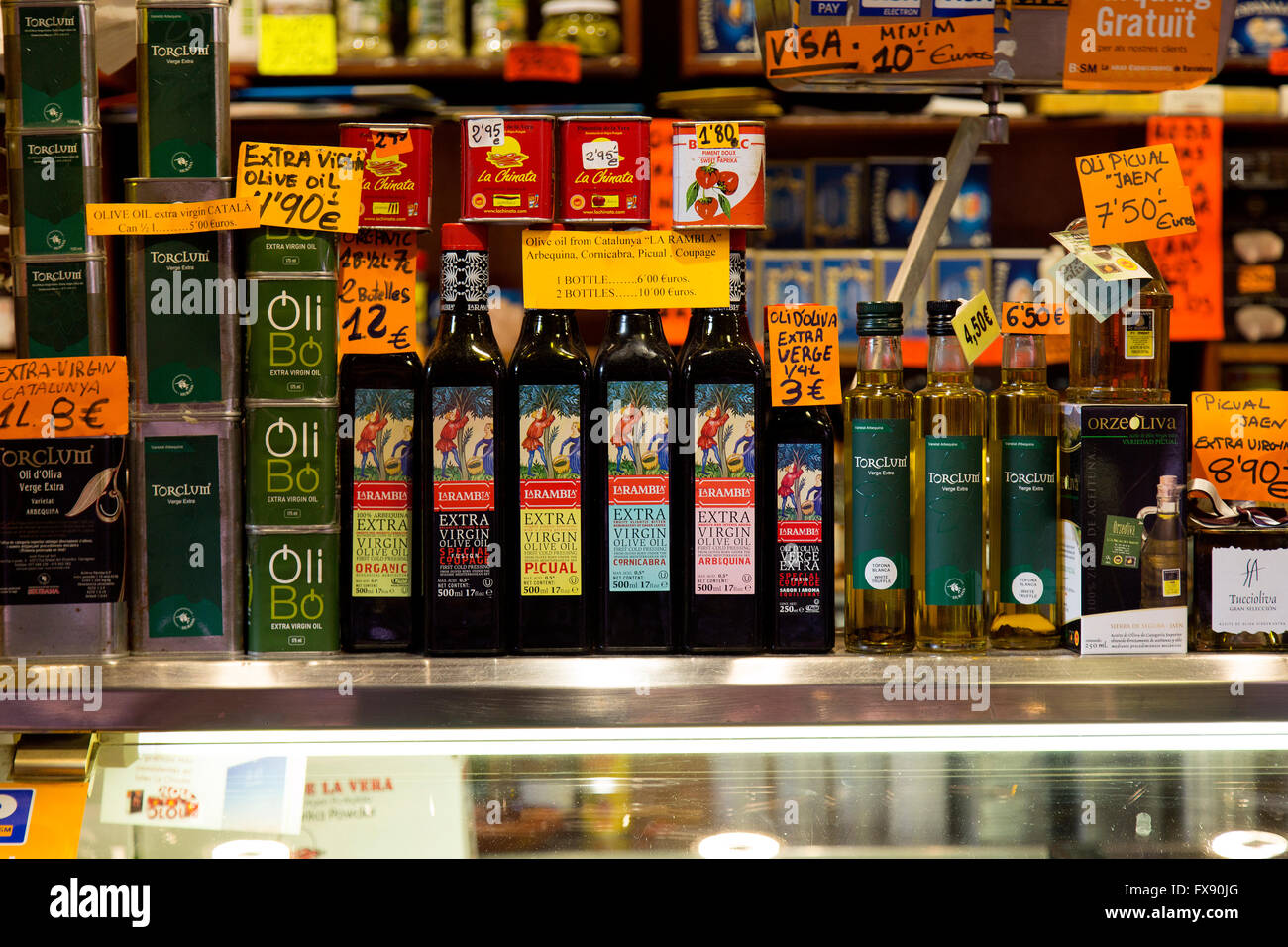 Colorful Rambla Olive Oil display in La Boqueria market in Barcelona