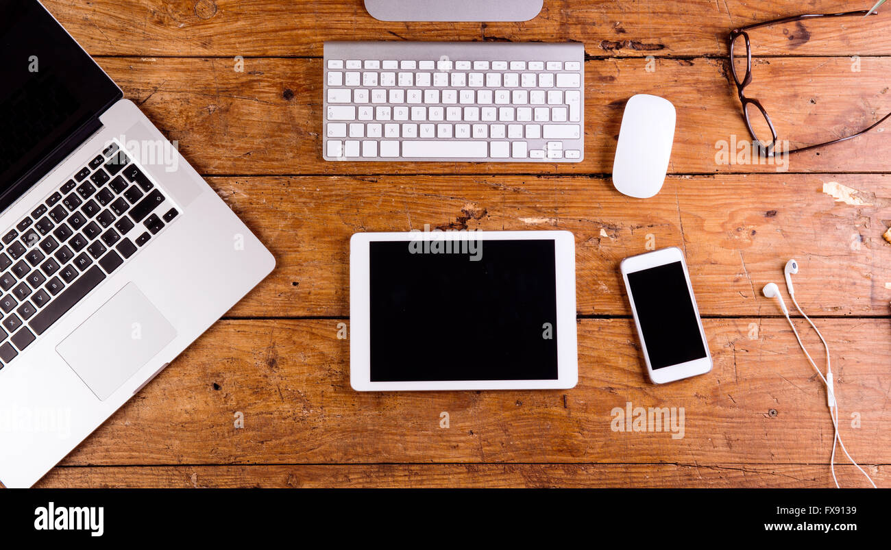 Desk Gadgets And Office Supplies Flat Lay Wooden Desk Stock Photo -  Download Image Now - iStock