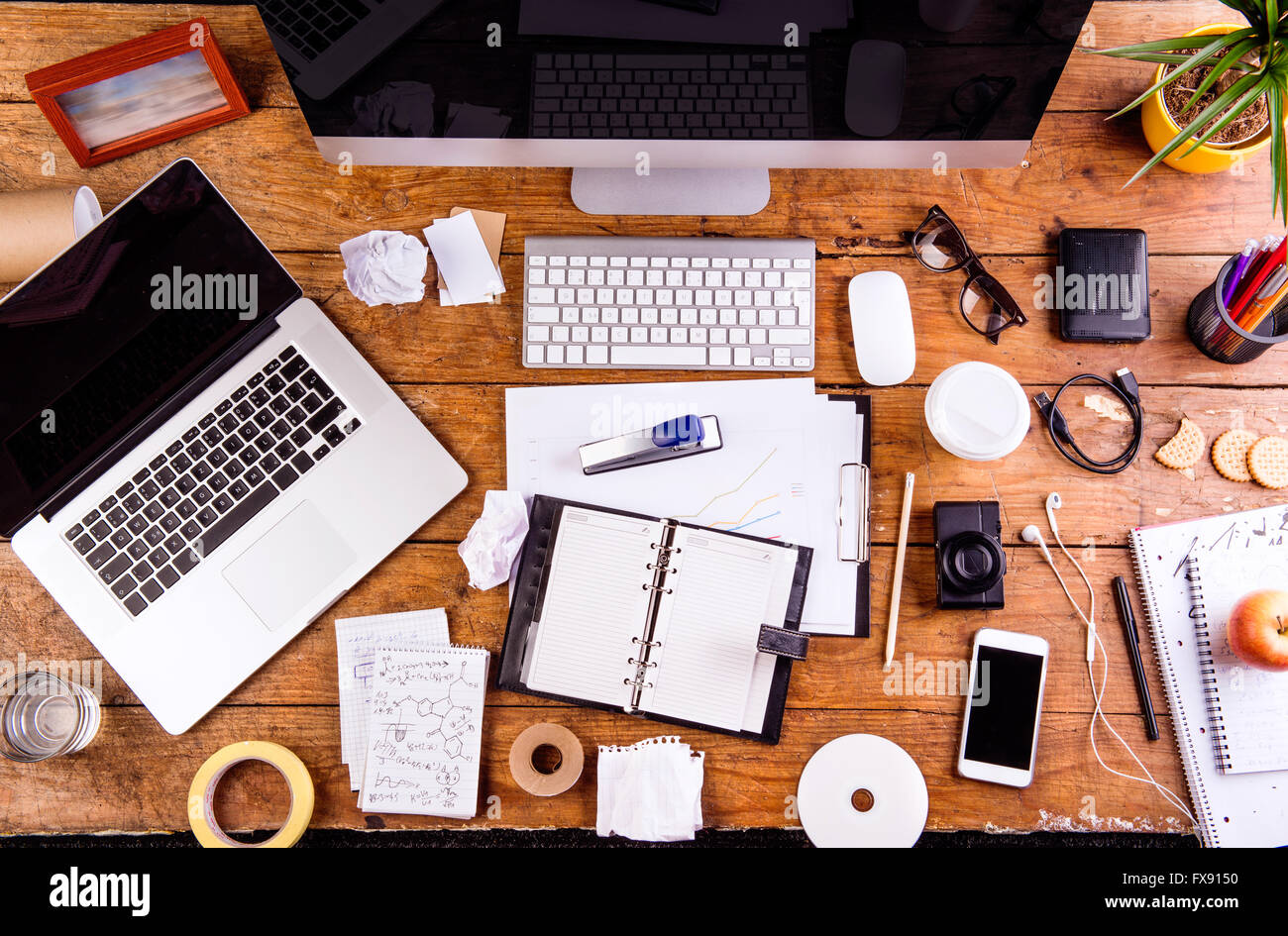 Desk with various gadgets and office supplies. Flat lay Stock Photo - Alamy