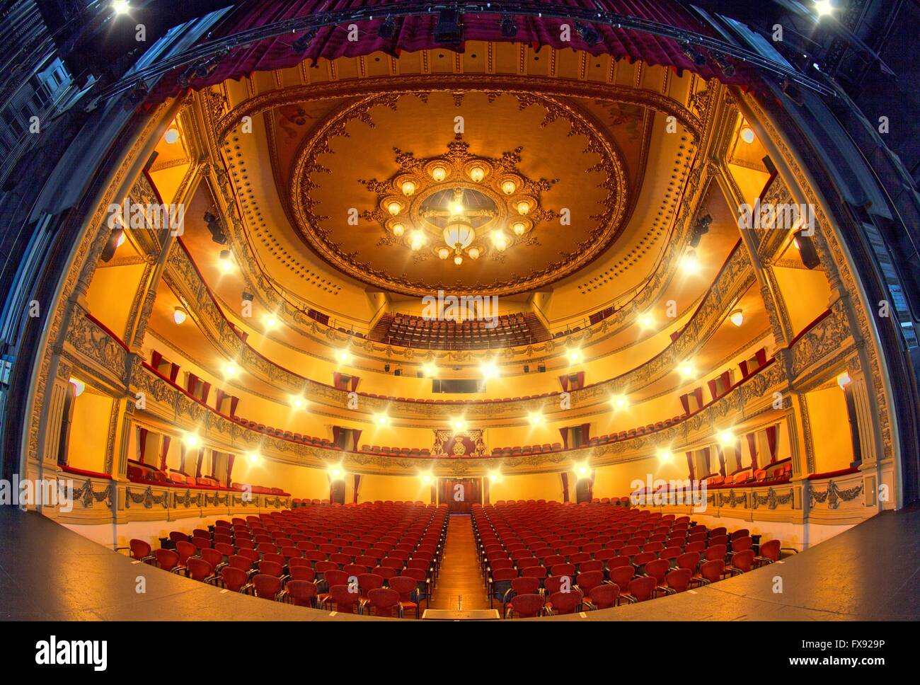 wide angle view of Guimera theatre stage with lowered curtain, stalls ...