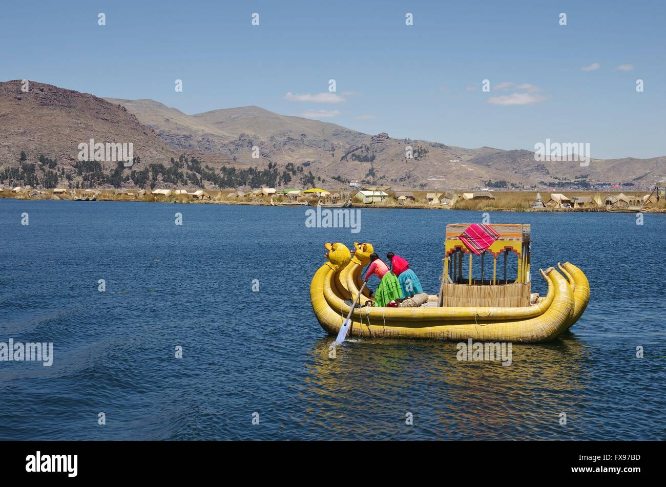 Reed boats as a tourist attraction on Lake Titicaca. Nowadays tourism ...