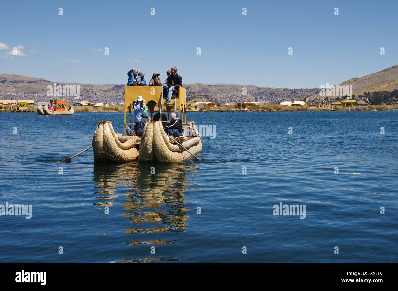 Reed boats as a tourist attraction on Lake Titicaca. Nowadays tourism ...