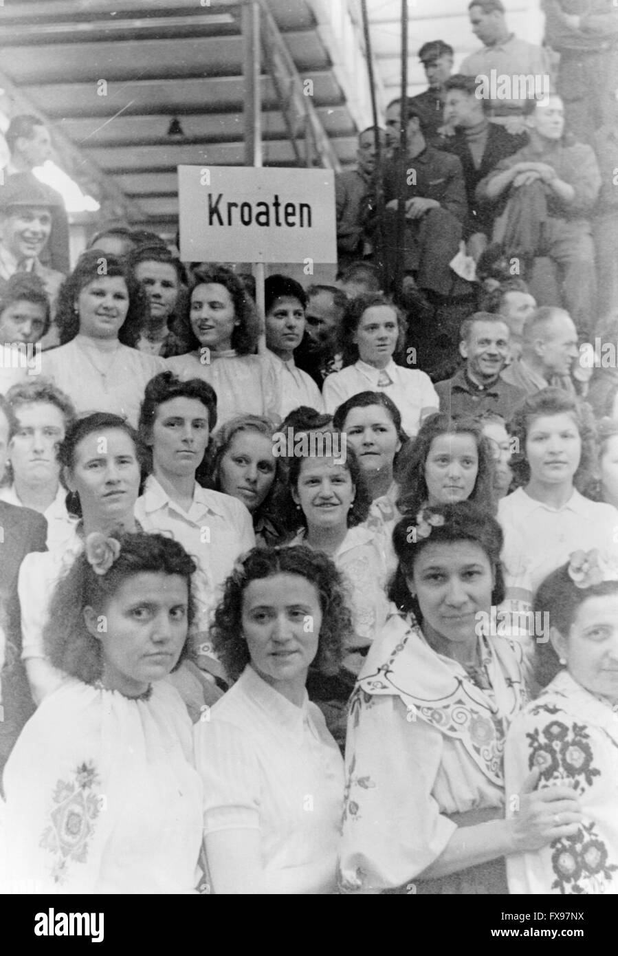 The Nazi propaganda picture shows female and male workers partly wearing costumes on the occasion of a demonstration with Robert Ley, the head of the German Labour Front, in a Berlin armament industry in May 1943. Fotoarchiv für Zeitgeschichte Archive - NO WIRE SERVICE - Stock Photo