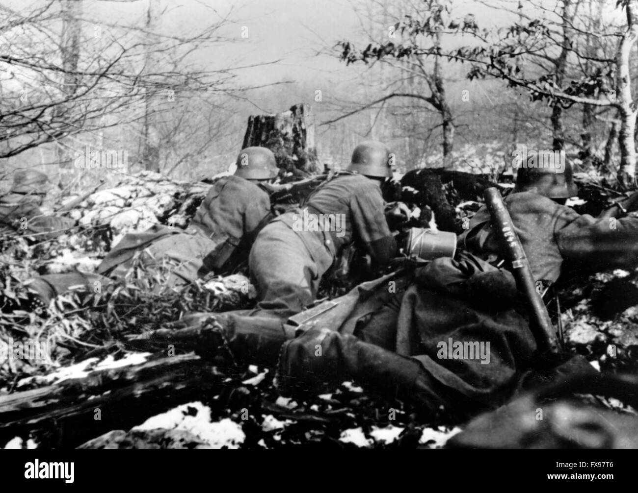 The Nazi propaganda image depicts soldiers of the German Wehrmacht fighting partisans in Yugoslavia. The photo was published in March 1943. Since summer 1942, the name 'partisan' had been prohibited by the Germans for psychological reasons and replaced by the name 'Banden' (gangs), 'Banditen' (bandits), and 'Bandenbekaempfung' (fighting gangs). Fotoarchiv für Zeitgeschichtee - NO WIRE SERVICE - Stock Photo