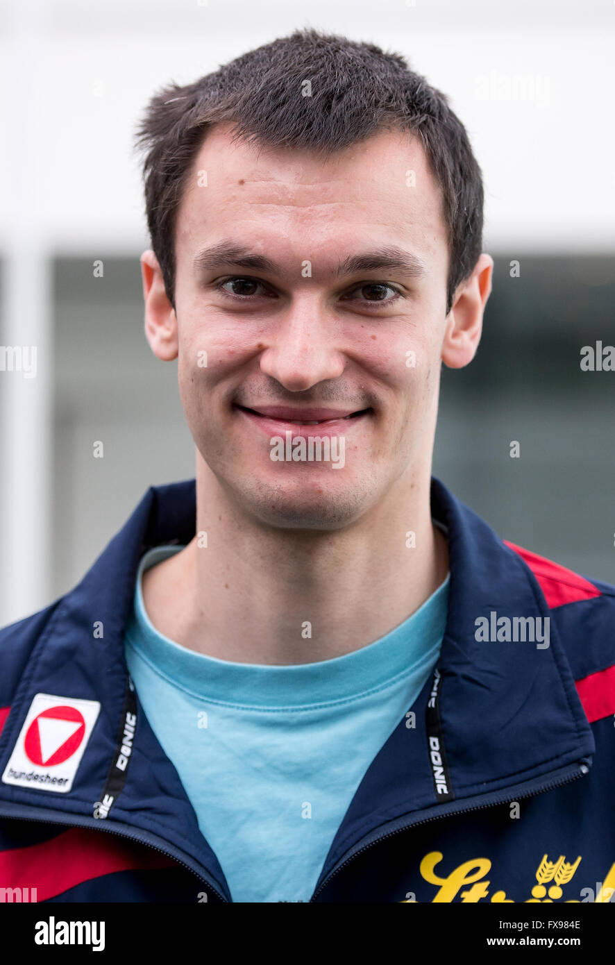 Munich, Germany. 12th Apr, 2016. Austrian table tennis player Stefan Fegerl poses during a media