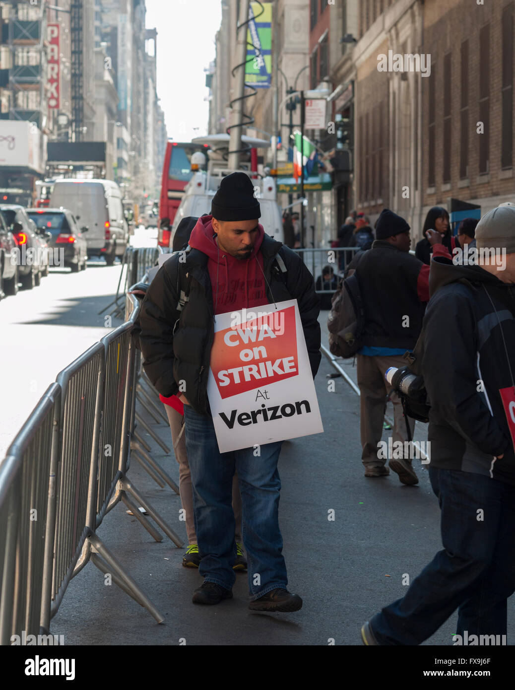 New York, USA. 13th Apr, 2016. Striking Verizon workers picket outside a Verizon facility in Midtown Manhattan in New York on Wednesday, April 13, 2016. Almost 40,000 members of the Communications Workers of America and the International Brotherhood of Electrical Workers walked out in nine eastern states and Washington DC over various contract disputes including healthcare and scheduling flexibility. Credit:  Richard Levine/Alamy Live News Stock Photo