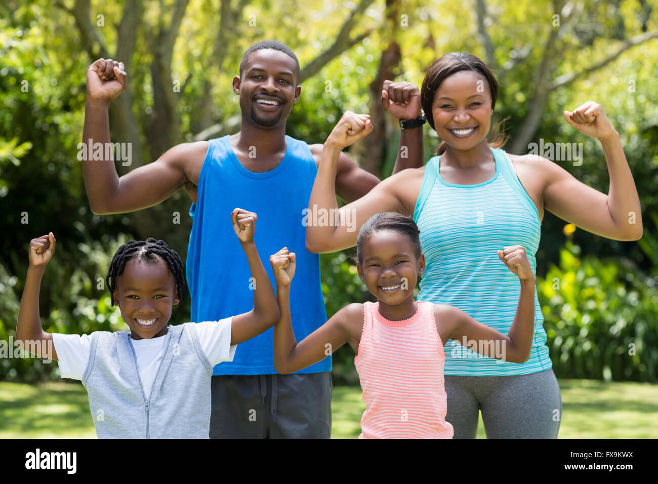 Happy family posing together Stock Photo - Alamy