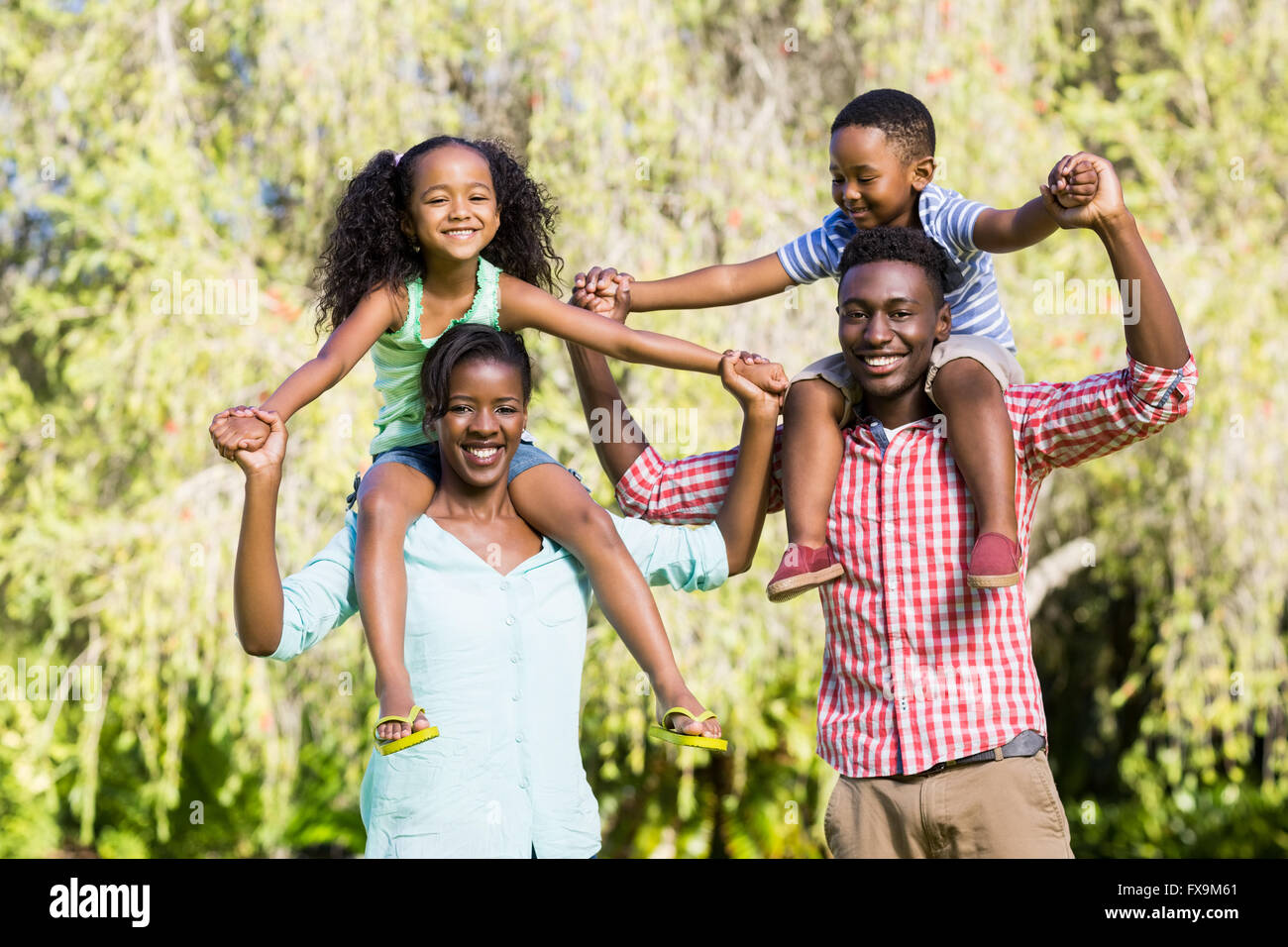 Happy family posing together Stock Photo - Alamy