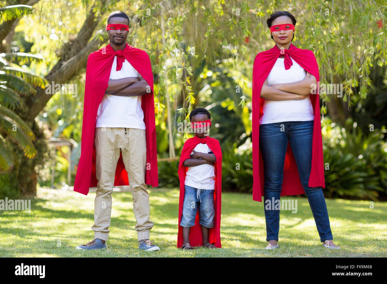 Happy family dressing up Stock Photo Alamy