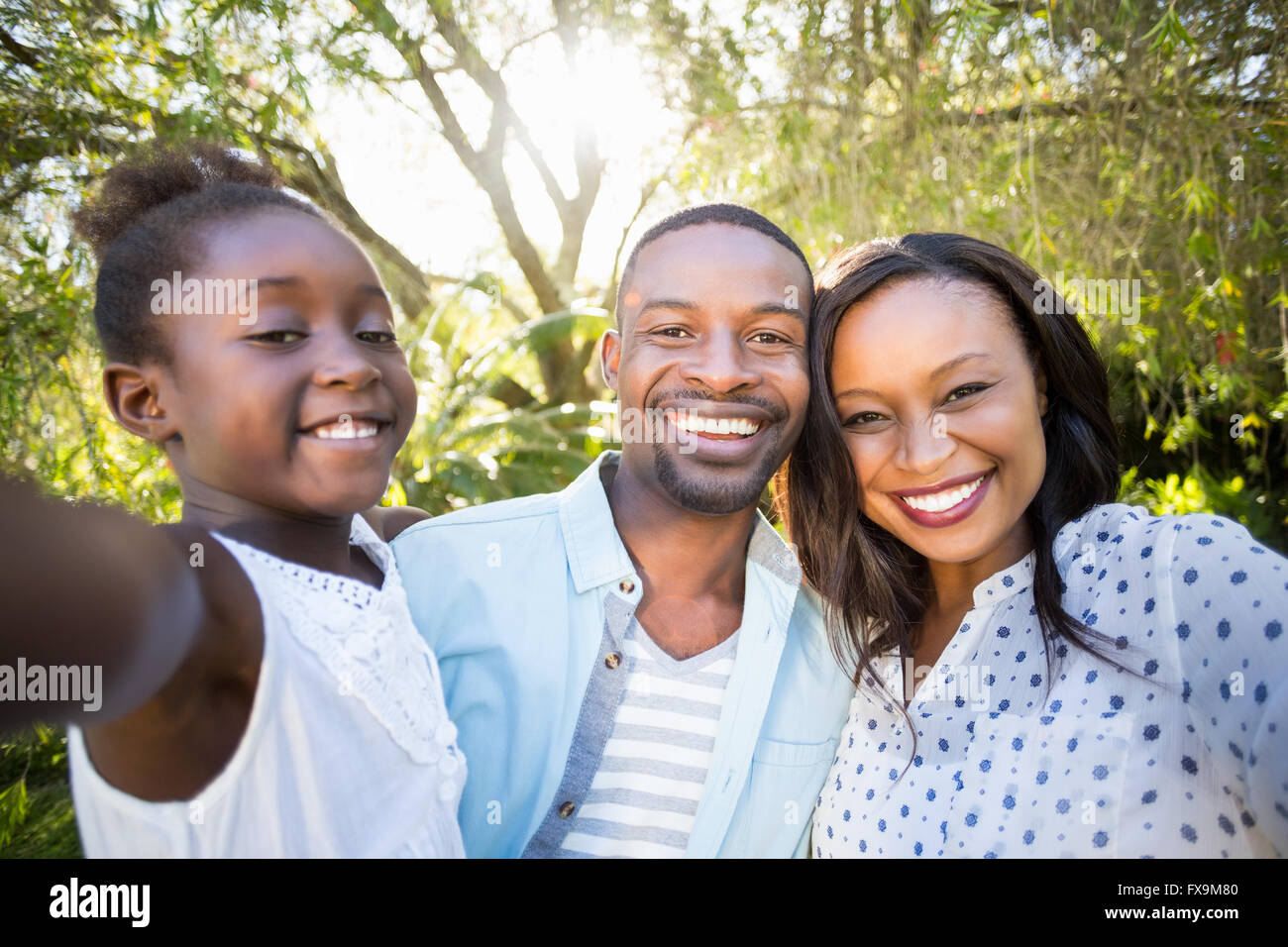 Happy family posing together Stock Photo - Alamy