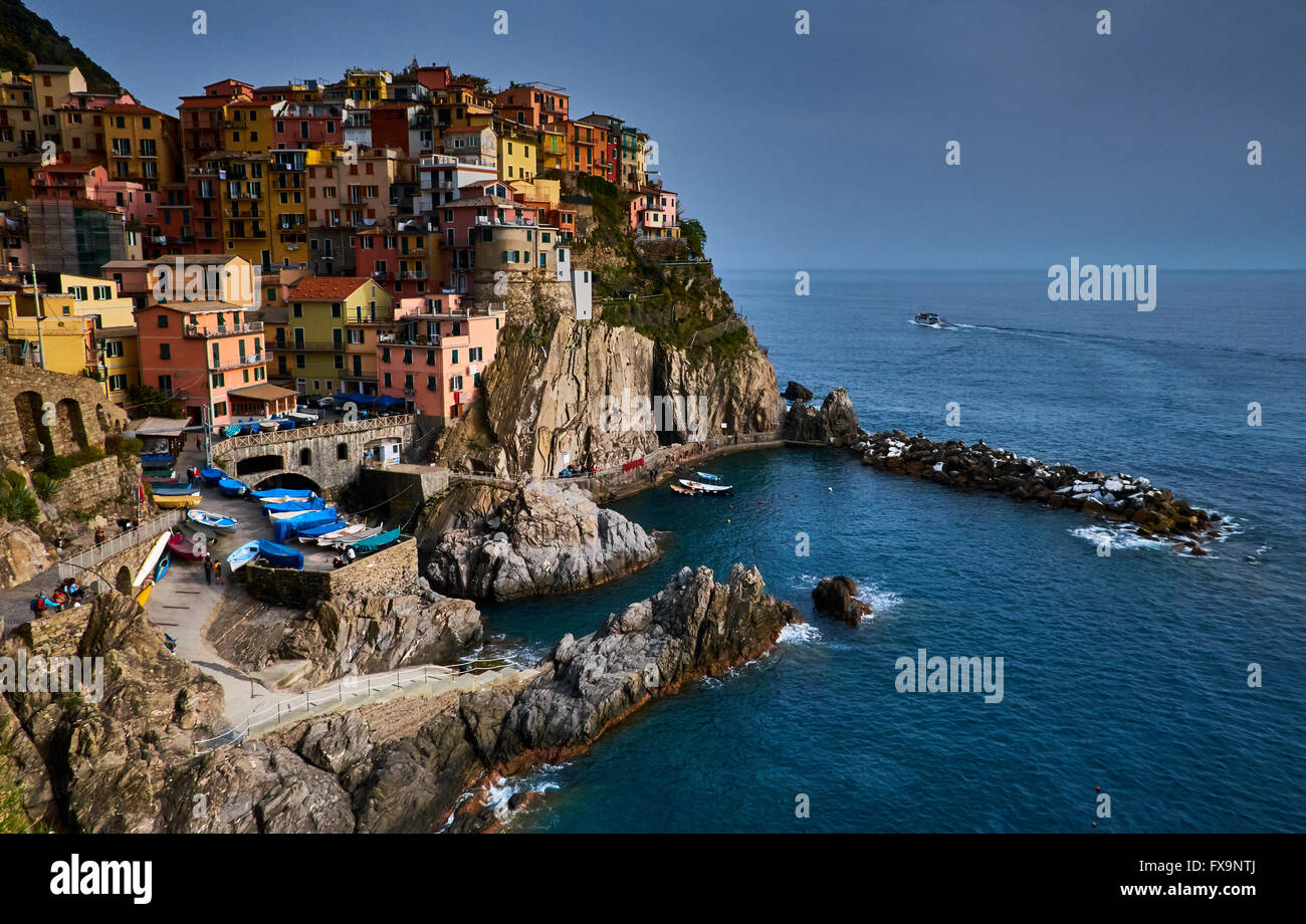 Manarola, part of the Cinque Terre on Italy's north west coast, early April  2016, showing colorful houses and the harbor Stock Photo - Alamy