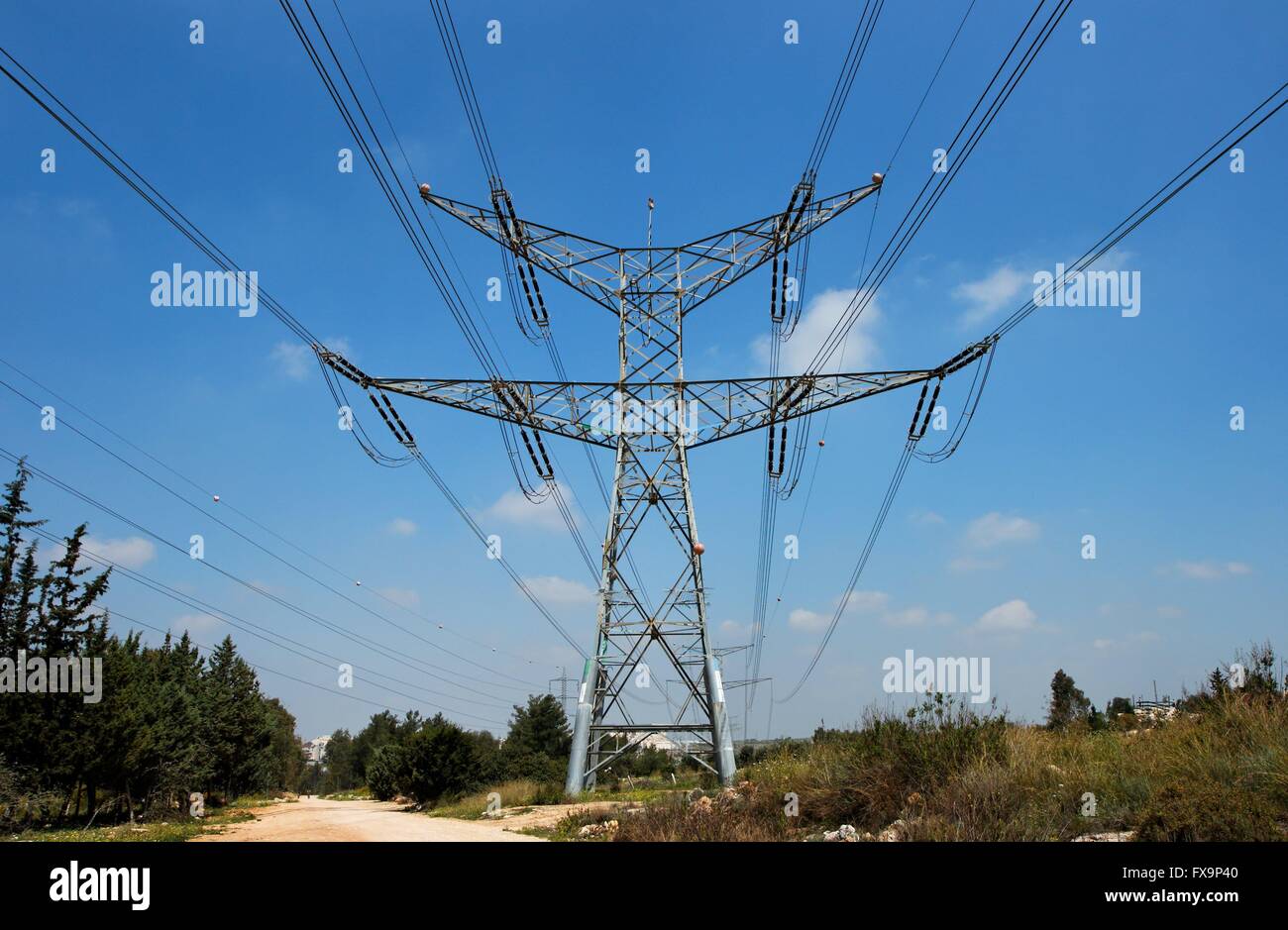 Two-tiered steel support of overhead power transmission line Stock Photo
