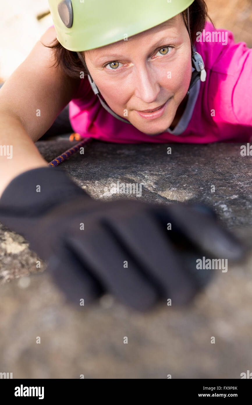Woman rock climbing Stock Photo - Alamy