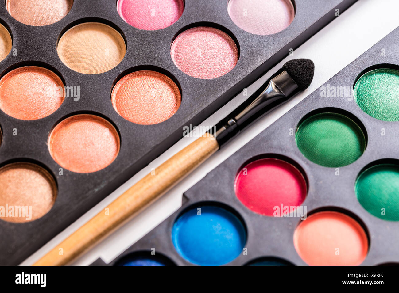 set of decorative cosmetics, Eyeshadow Palette and brush Stock Photo Alamy