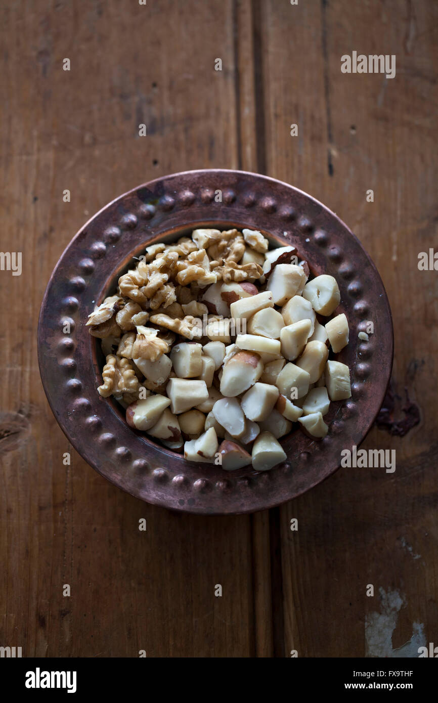 Chopped walnuts and Brazil nuts in a bowl Stock Photo Alamy
