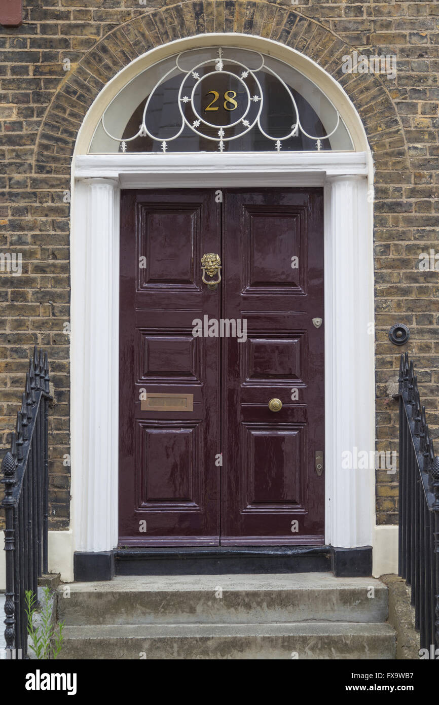A Georgian era six-panel front door with a period fanlight in Great Percy Street, Islington, London WC1 Stock Photo