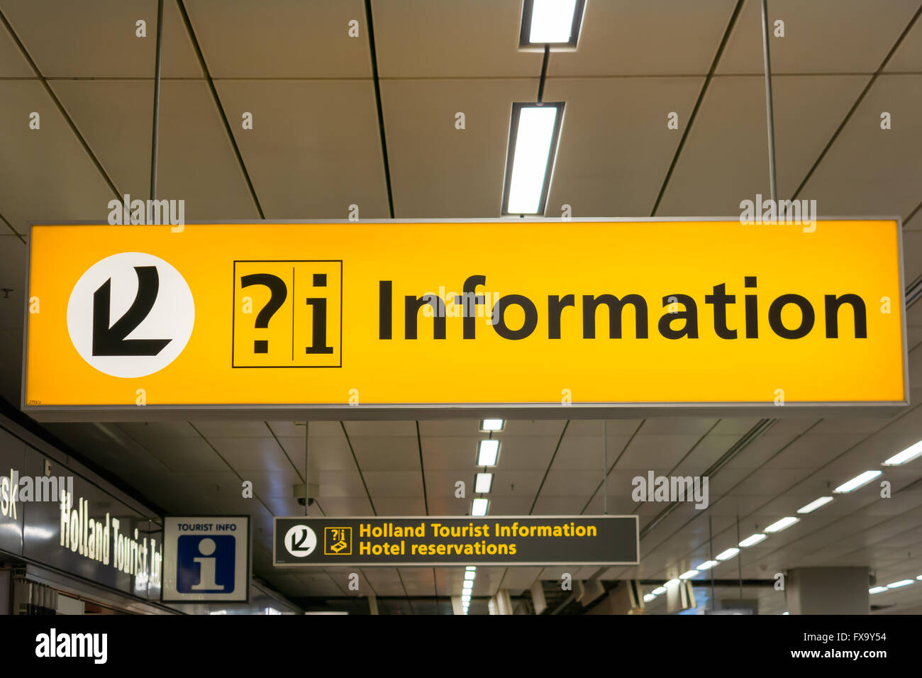 Information and tourism signs in arrivals terminal of Schiphol Amsterdam Airport, Netherlands Stock Photo