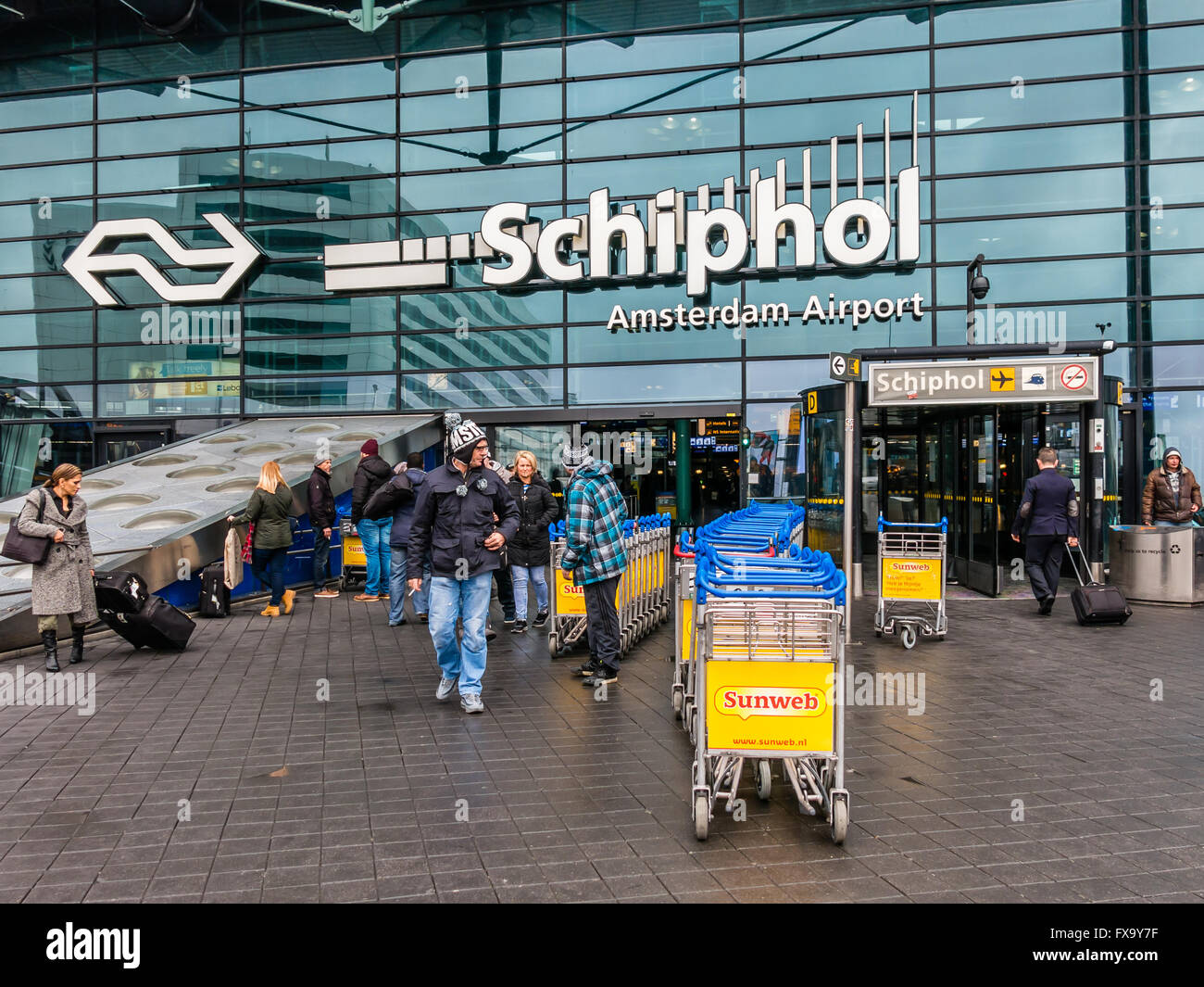 People outside Schiphol Amsterdam Airport in the Netherlands Stock Photo