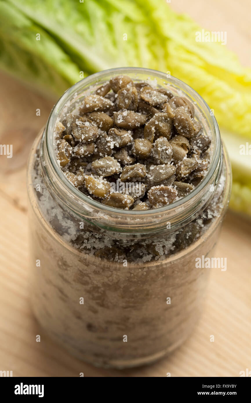 Salted capers in a glass jar Stock Photo Alamy
