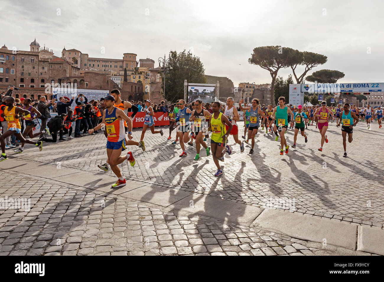 Running Races In Rome Athletes at the start of the Rome marathon in 2016. Rome, Italy - April ...